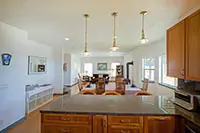 Open kitchen and dining area with modern amenities at a Shelter Cove vacation rental near the Northern California coast.