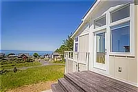 Cottage deck and exterior with ocean view